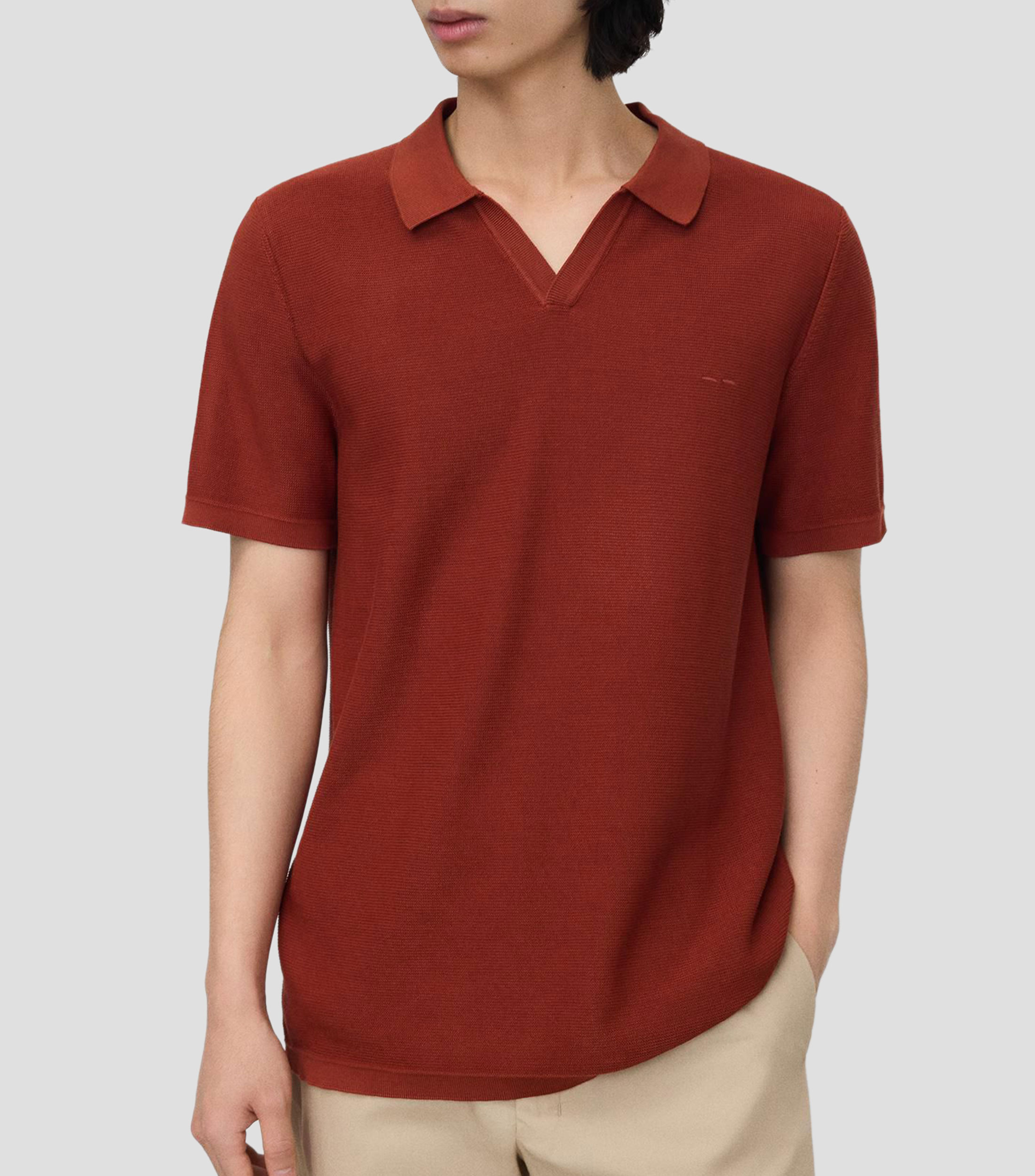 Playera tipo polo con manga corta lisa Hombre